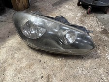 Farol Volkswagen Golf/Jetta Sportwagen 2010-14 carcaça preta lado direito comprar usado  Enviando para Brazil