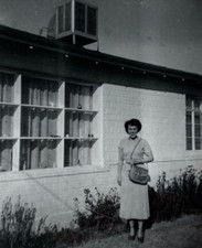 Woman holding purse for sale  Foley
