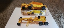 Brinquedo vintage Caterpillar Revell miniatura trator e motoniveladora década de 1950 EUA, usado comprar usado  Enviando para Brazil