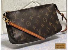 Louis vuitton pochette d'occasion  Expédié en Belgium