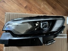 Genuine left headlight d'occasion  Expédié en Belgium