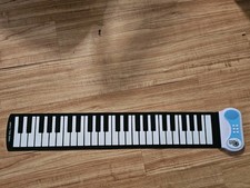 Juguetes MukikiM Rock and Roll It! Piano enrollable flexible 49 teclas probado funciona segunda mano  Embacar hacia Mexico