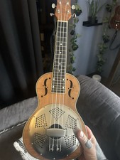 Ukulele ressonador de bordo encaracolado escala concerto tom dourado com bolsa gig natural comprar usado  Enviando para Brazil