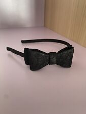 Cerchietto nero camomilla usato  Monserrato