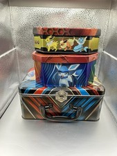Three pokemon tins for sale  Raymond