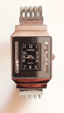 montre argent femme bracelet rigide d'occasion montre argent femme bracelet rigide d'occasion  Saint-Loubès