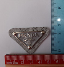 Targhetta prada triangolo usato  Caselle Torinese