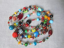 Long collier sautoir d'occasion  Chamarande