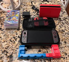 Nintendo Switch OLED Rojo con Paquete de Juego Mario Odysyssy, Maro Cart 8 y más segunda mano  Embacar hacia Mexico