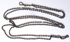Grand collier sautoir d'occasion  Paris IX