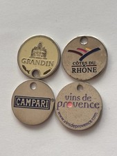 Usado, Lot X 4 Jetons De Caddie Métal Différents Marques Alcool Vin  : Campari, … comprar usado  Enviando para Brazil