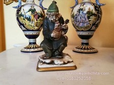 Statua anziano con usato  Roma