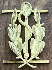 Ancien insigne service d'occasion  Pont-l'Abbé-d'Arnoult