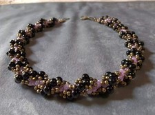 Collana nero viola usato  Agrigento