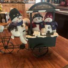 3 bonecos de neve em uma bicicleta vendendo bolas de neve 12x11” comprar usado  Enviando para Brazil