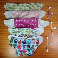 Usado, Lote de 5 conchas de fraldas de pano marcas Woblybug Fuzzibunz e 3 pinos Snappi comprar usado  Enviando para Brazil