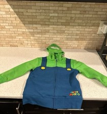 Chaqueta Super Nintendo World Luigi Universal Studios Talla pequeña b15 segunda mano  Embacar hacia Mexico