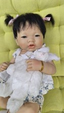 Poupée bébé asiatique d'occasion  La Ciotat