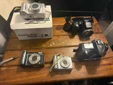 Canon nikon camera d'occasion  Expédié en Belgium