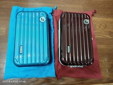 2 Rimowa vermelho rubi + azul california EVA Air kit de amenidades bolsa de higiene comprar usado 2 Rimowa vermelho rubi + azul california EVA Air kit de amenidades bolsa de higiene comprar usado  Enviando para Brazil
