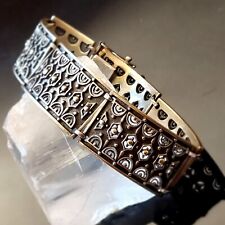 Bracelet articulé art d'occasion  Le Luc