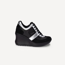 Sneakers con zeppa usato  Roma