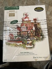 Dept. 56 - Máquina de trenó North Pole Series Papai Noel - Conjunto de 2 em caixa fechada, usado comprar usado  Enviando para Brazil