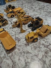 Conjunto de equipamentos de construção Ertl em escala 1/64 comprar usado  Enviando para Brazil