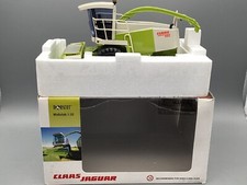 Ciągnik model 1:32 Norscot Claas Jaguar sieczkarnia polowa z pickupem w oryginalnym opakowaniu, używany na sprzedaż  Wysyłka do Poland
