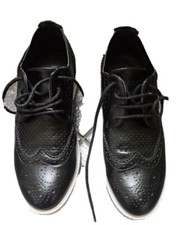 Sneakers nere traforate usato  Siniscola