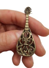 Miniatura statuetta chitarra usato  Roma