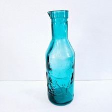 Garrafa de vidro vintage Absolutely Pure The Milk Protector azul turquesa em relevo comprar usado  Enviando para Brazil