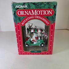 Ornamento rotativo Noma OrnaMotion carrinho de golfe Papai Noel para frente! #2372 1989 com caixa comprar usado  Enviando para Brazil
