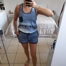 Tuta con pantaloncini usato  Cantu