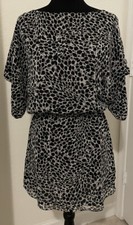 Mini vestido Jessica Simpson preto leopardo manga dolman blusa, médio - $89 varejo comprar usado  Enviando para Brazil