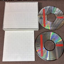 PINK FLOYD The Wall JAPAN CD 48DP5007~8 21A4 / 11A10 JPN BOOKLET Fat Jewel 1988 comprar usado PINK FLOYD The Wall JAPAN CD 48DP5007~8 21A4 / 11A10 JPN BOOKLET Fat Jewel 1988 comprar usado  Enviando para Brazil