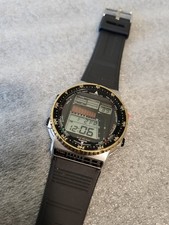 RELÓGIO DIGITAL VINTAGE CIDADÃO PROMASTER D120 WINDSURF DÉCADA DE 1980 MOLDURA DOURADA - NOVA BATALHA comprar usado RELÓGIO DIGITAL VINTAGE CIDADÃO PROMASTER D120 WINDSURF DÉCADA DE 1980 MOLDURA DOURADA - NOVA BATALHA comprar usado  Enviando para Brazil