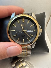 Relógio masculino Seiko SNE098 mostrador cinza solar luminoso dois tons DEFEITO-H2 comprar usado  Enviando para Brazil