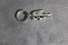 Lacoste porte clé d'occasion  Village-Neuf