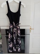 Robe noire fleurie d'occasion  Puisserguier
