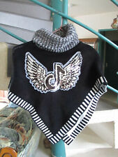 Poncho noir taille d'occasion  Bletterans