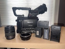 Panasonic AF100 com 3 baterias + carregador, lente 14-45mm e adaptador EF-Micro 4/3 comprar usado  Enviando para Brazil