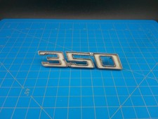 Emblema de metal vintage Chevrolet 350 fabricante de equipamento original PT 3968323 motor Chevy clássico comprar usado Emblema de metal vintage Chevrolet 350 fabricante de equipamento original PT 3968323 motor Chevy clássico comprar usado  Enviando para Brazil