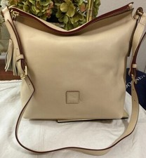 Dooney bourke bone d'occasion  Expédié en Belgium