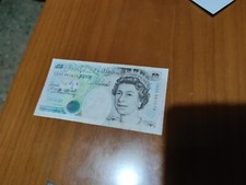 Five pounds. sterline. usato  Clusone