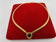 Collier doré noir d'occasion  Pornichet