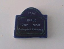 Feve publicitaire poujauran d'occasion  Paris VII