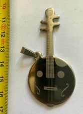 Pendentif guitar métal d'occasion  Saint-Omer