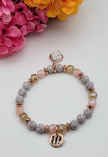 Pulseira elástica amuleto Howlite cinza cristal bomba festa rosa tom dourado ajustável. comprar usado  Enviando para Brazil