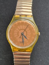 Używany, Zegarek męski Swatch miedziany zmierzch 34mm brązowa tarcza przezroczysta obudowa okrągła AG1990 nowa bateria na sprzedaż  PL
